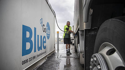 Truck driver filling truck with GoClear AdBlue 